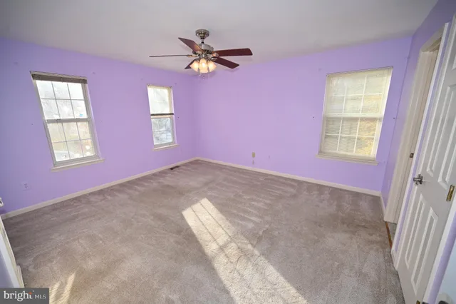 a view of a backyard of the house