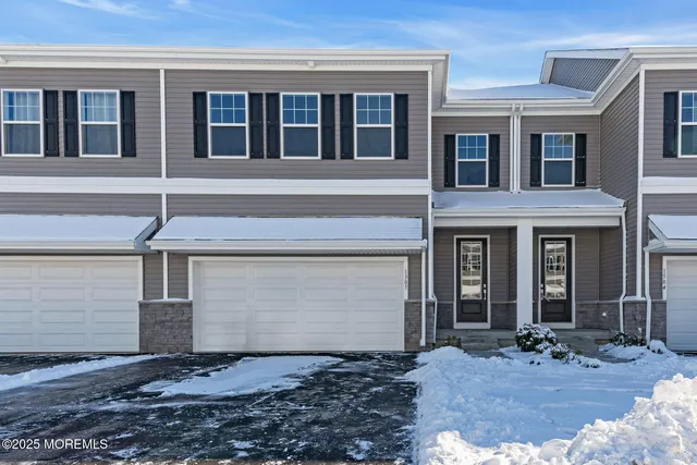 a view of house with yard