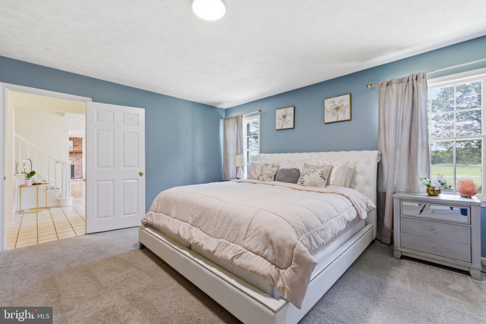 860 Hartwood Road Fredericksburg, VA 22406 - Photo 14 of 24 Serene bedroom with calming hues.