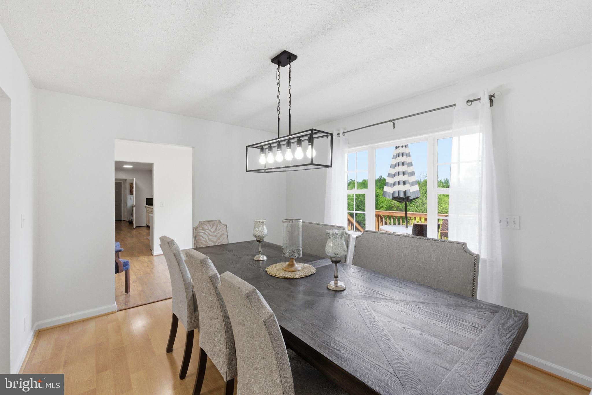 860 Hartwood Road Fredericksburg, VA 22406 - Photo 7 of 24 Bright dining space with scenic views.