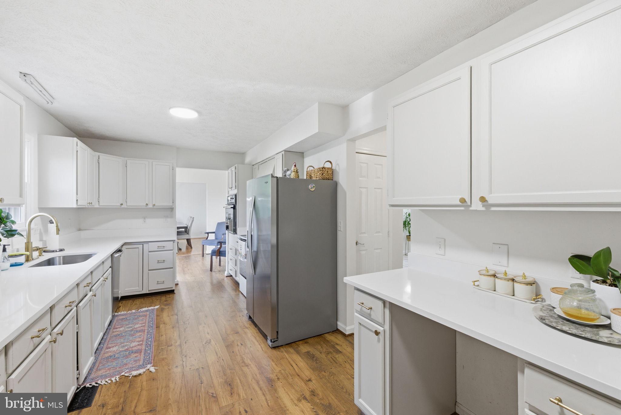 860 Hartwood Road Fredericksburg, VA 22406 - Photo 9 of 24 Bright and airy modern kitchen space.