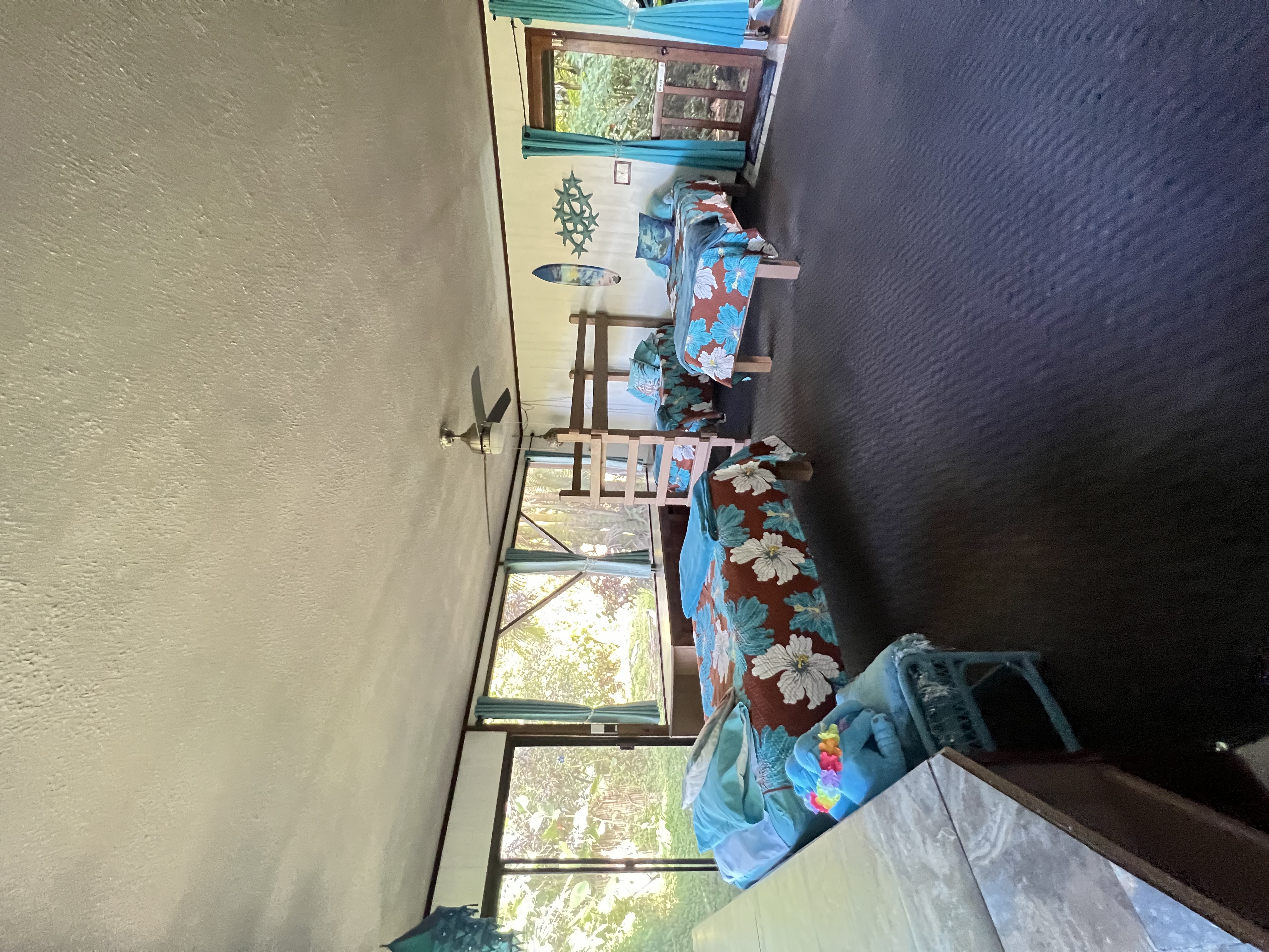 173 Opio Road Hilo, HI 96720 - Photo 9 of 27 a view of a room with gym equipment