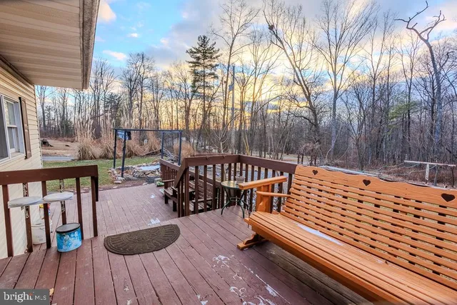 a outdoor view with sitting space and trees
