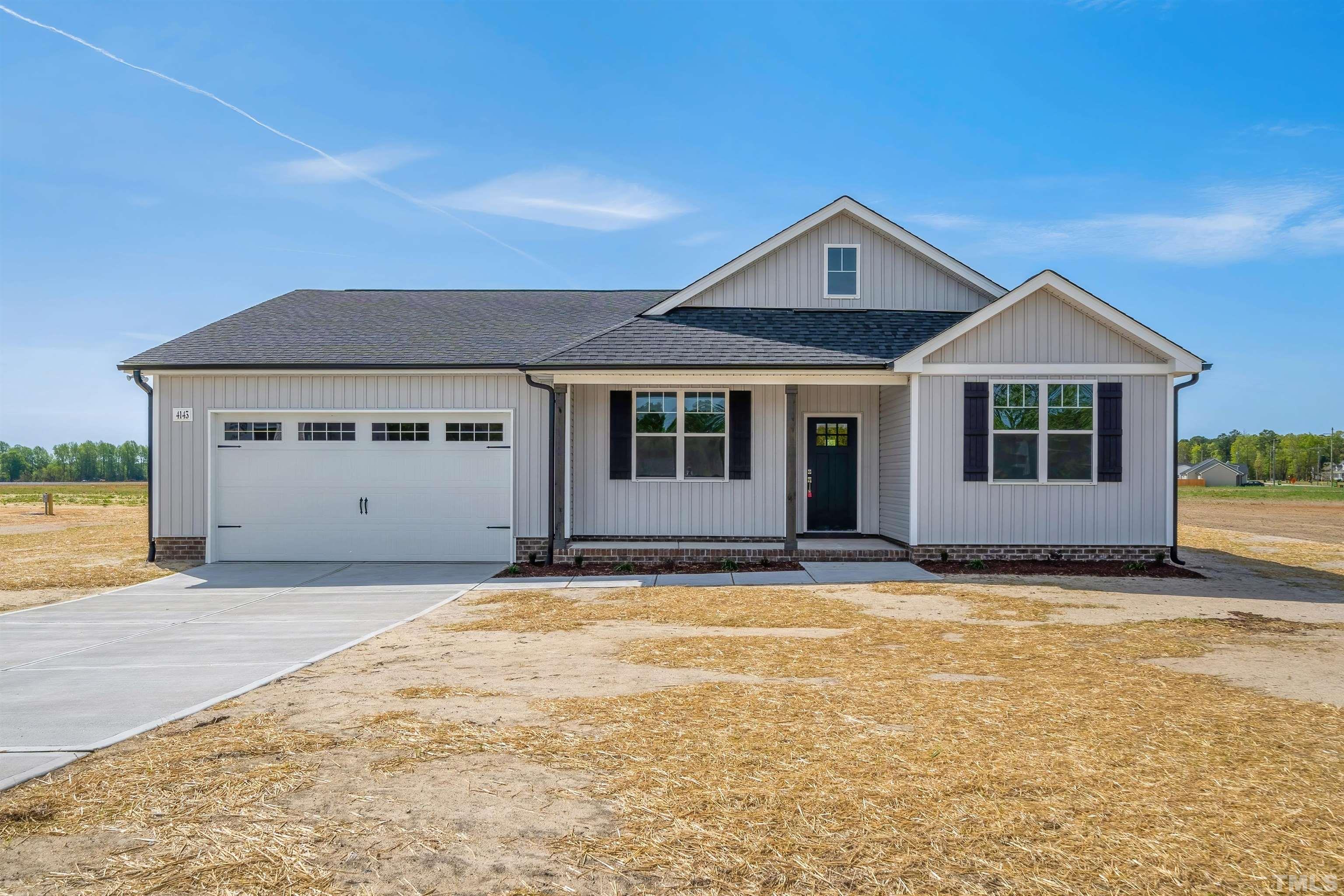 4143 Needham Road Bailey, NC 27807 - Photo 1 of 25 a view of a house with pool and yard