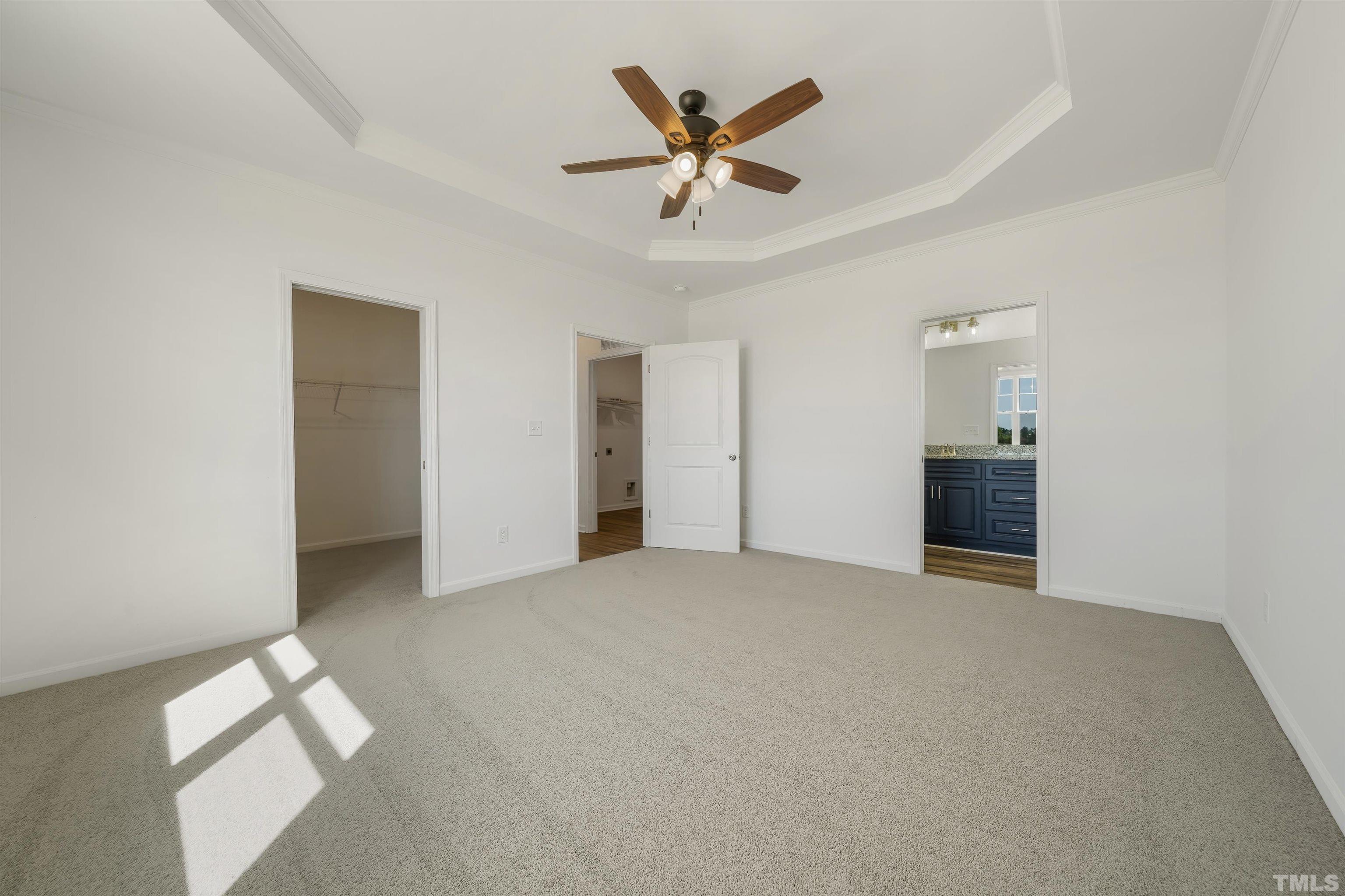 4143 Needham Road Bailey, NC 27807 - Photo 9 of 25 an empty room with a ceiling fan and window