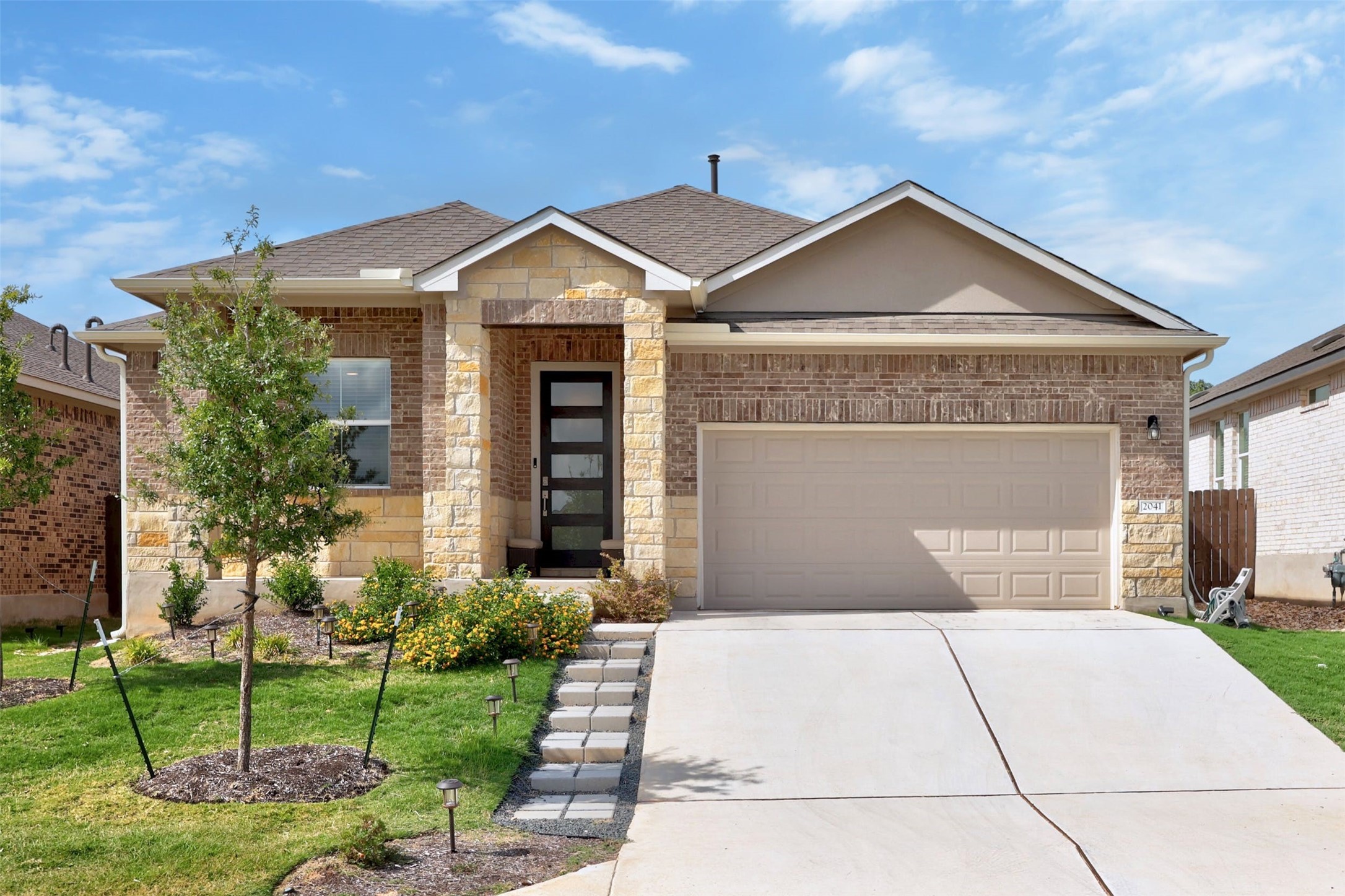 2041 Centerline Lane Georgetown, TX 78628 - Photo 1 of 31 a front view of a house with a yard