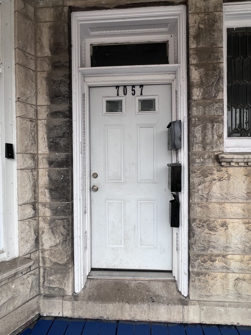7057 South Normal Boulevard, Unit 2 Chicago, IL 60621 - Photo 2 of 46 a view of a door of the house