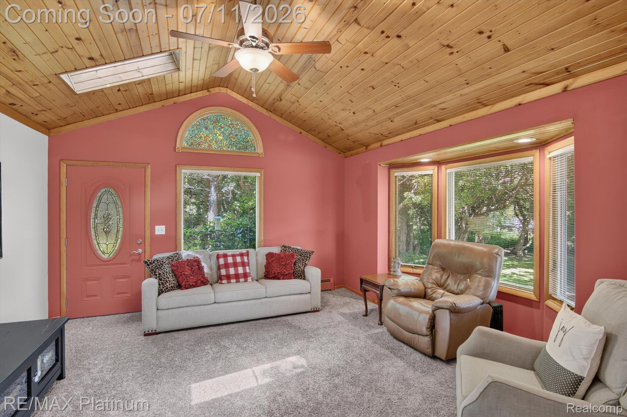 13365 North Territorial Road Gregory, MI 48137 - Photo 13 of 52 Vaulted wood-finish ceiling featuring a ceiling fan and skylight