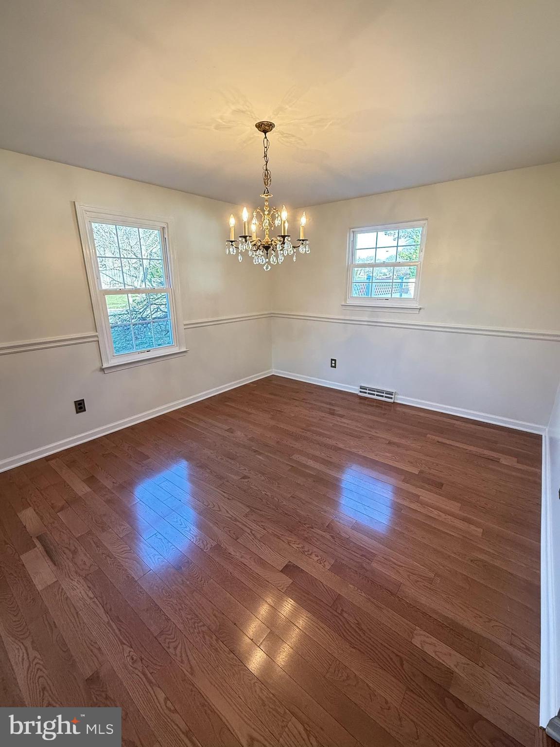 142 Fox Chase Drive Delran, NJ 08075 - Photo 12 of 26 wooden floor in an empty room with a window