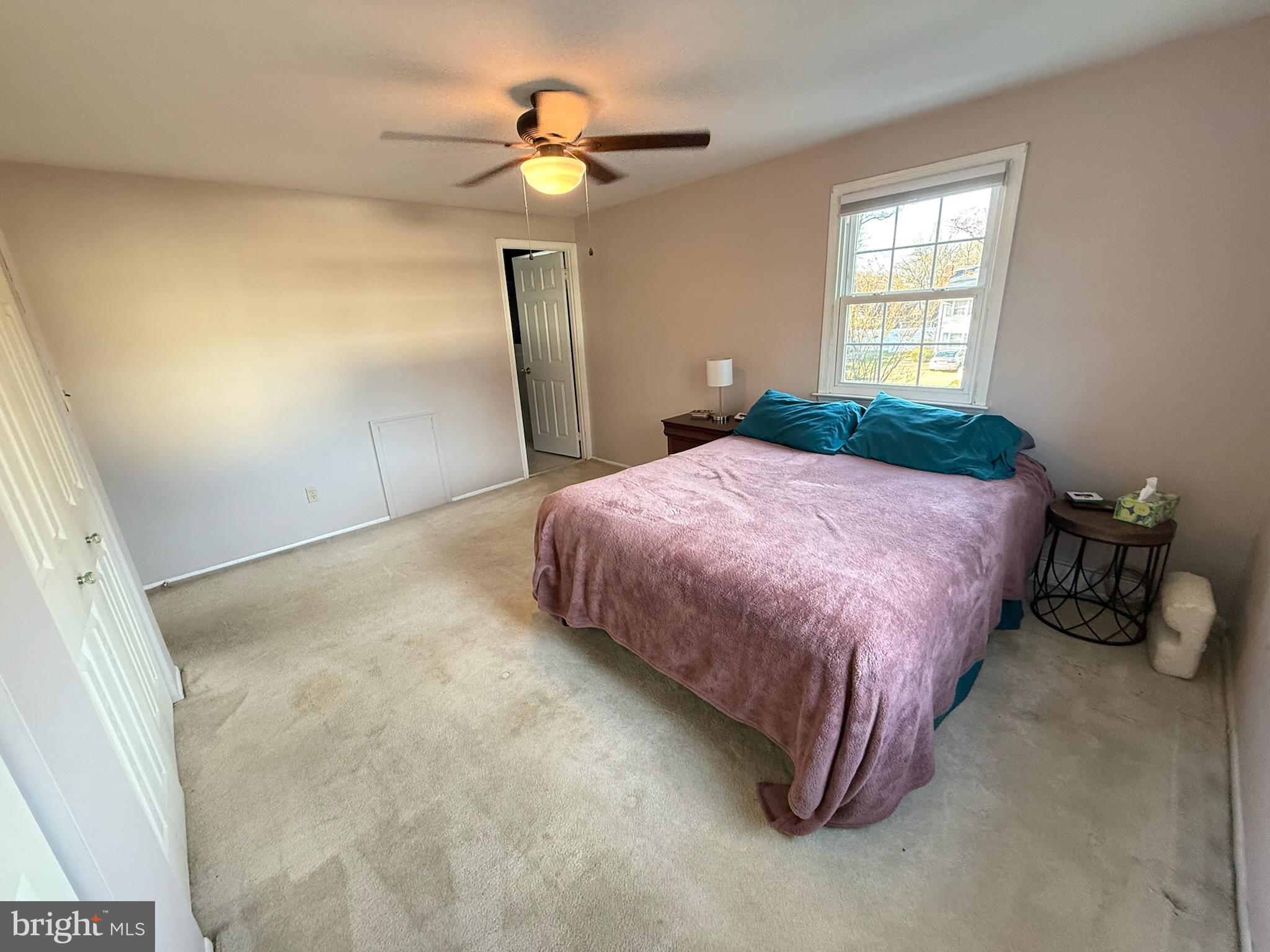 142 Fox Chase Drive Delran, NJ 08075 - Photo 19 of 26 a bedroom with a bed and a chandelier