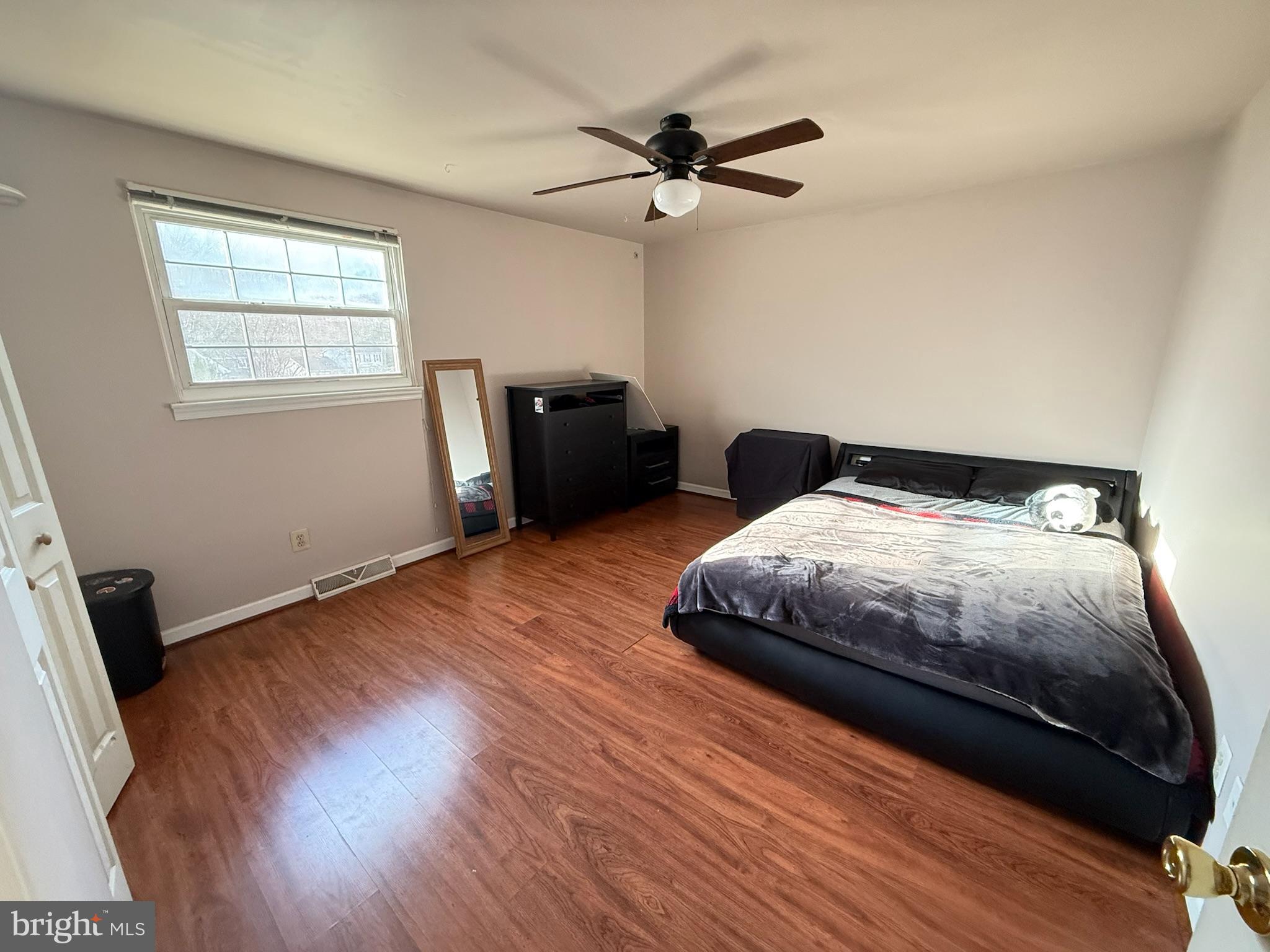 142 Fox Chase Drive Delran, NJ 08075 - Photo 20 of 26 a bedroom with a bed and wooden floor