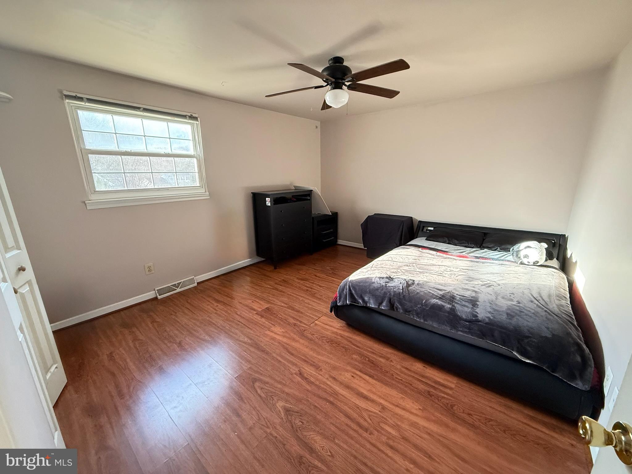 142 Fox Chase Drive Delran, NJ 08075 - Photo 21 of 26 a bedroom with a bed and wooden floor