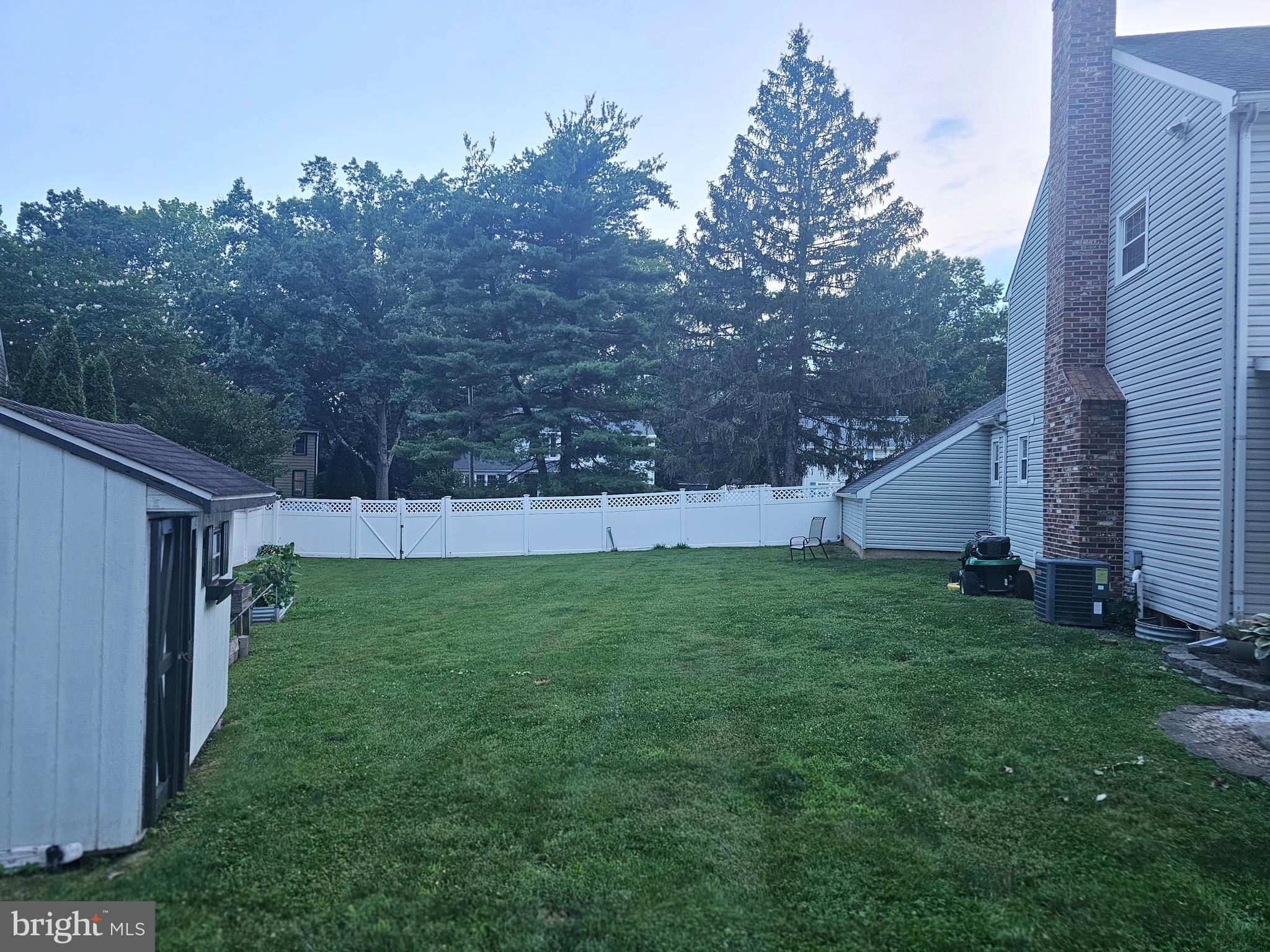 142 Fox Chase Drive Delran, NJ 08075 - Photo 24 of 26 a view of a backyard with barn and large trees