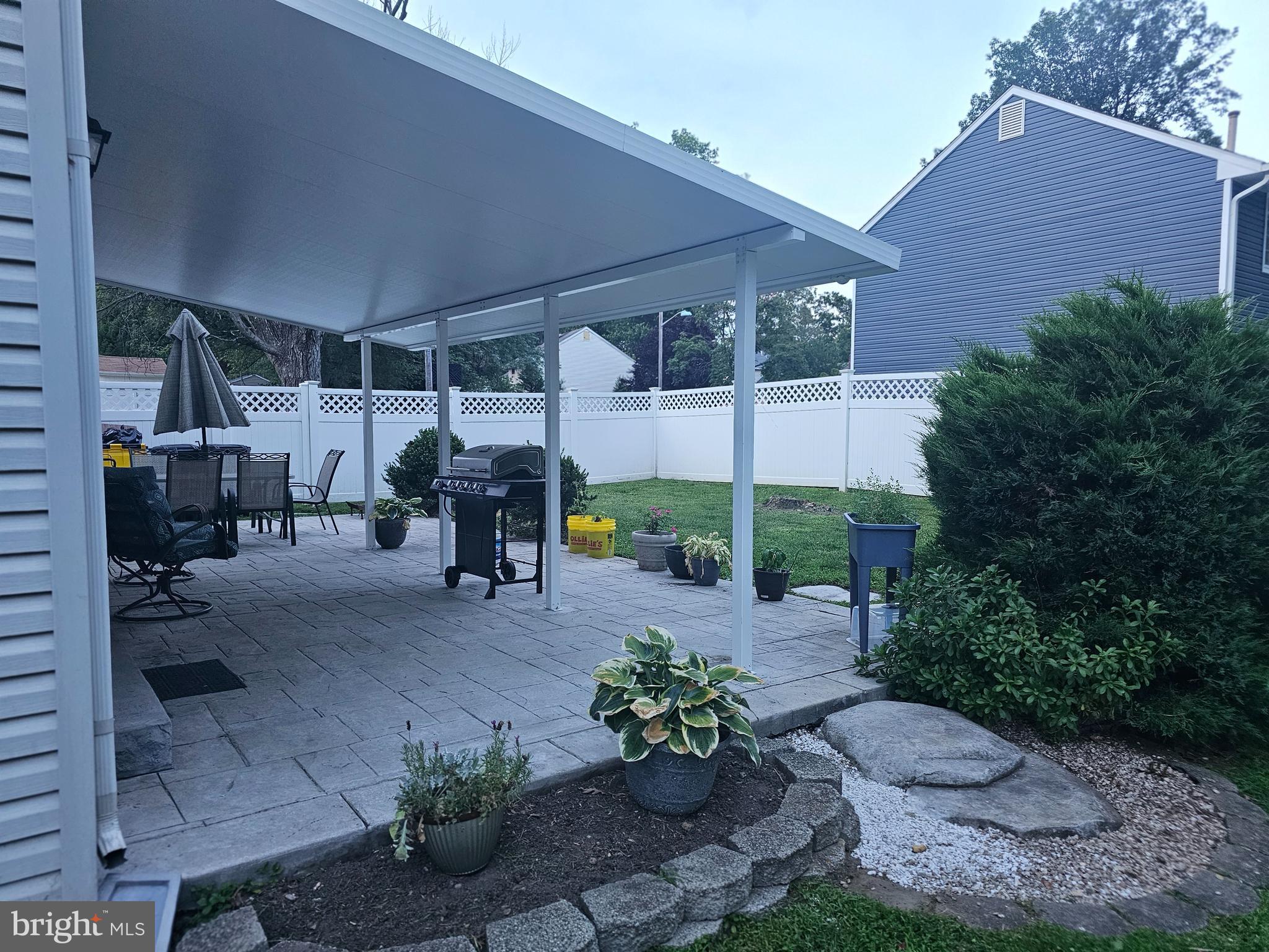 142 Fox Chase Drive Delran, NJ 08075 - Photo 26 of 26 a wooden bench sitting in front of a building