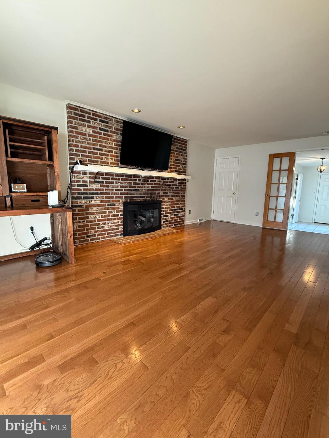 142 Fox Chase Drive Delran, NJ 08075 - Photo 6 of 26 a view of livingroom with kitchen and fireplace