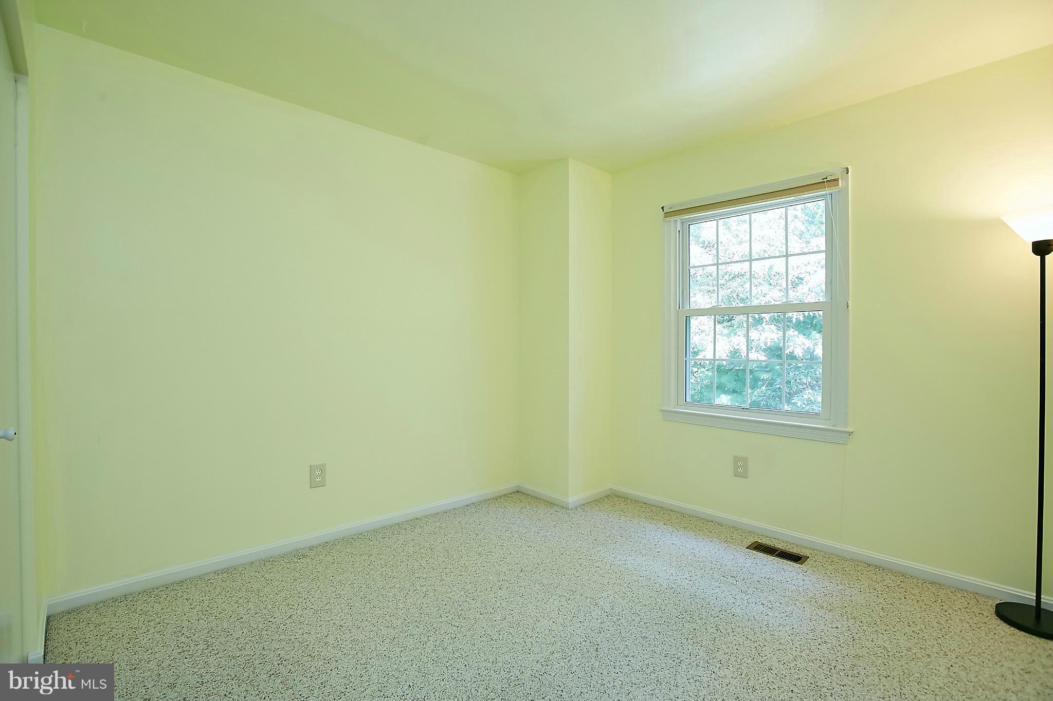 8567 Tyrolean Way Springfield, VA 22153 - Photo 19 of 29 an empty room with a window