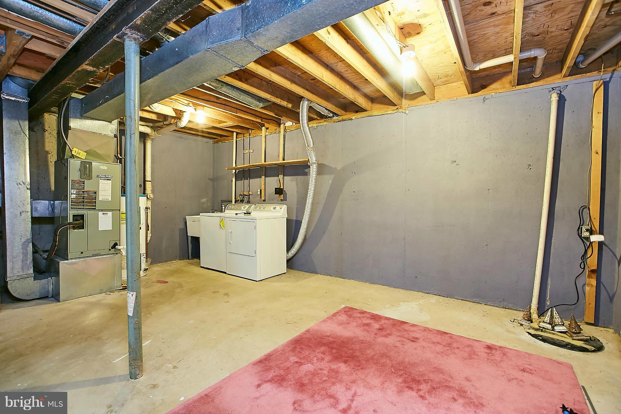 8567 Tyrolean Way Springfield, VA 22153 - Photo 25 of 29 a bathroom with a sink and shower