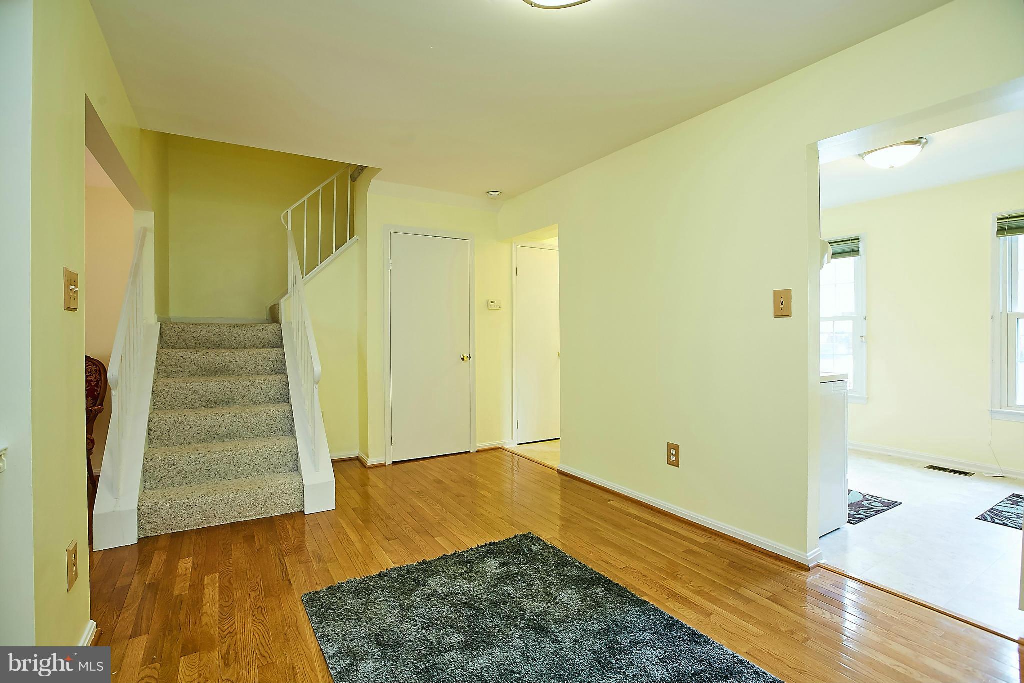 8567 Tyrolean Way Springfield, VA 22153 - Photo 9 of 29 a view of entryway with wooden floor