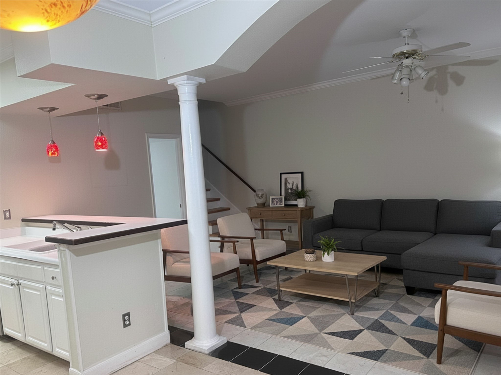 7347 Regency Square Court, Unit 7347 Houston, TX 77036 - Photo 6 of 12 a living room with furniture and a table