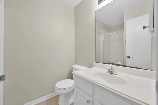 a front view of a house with a garage