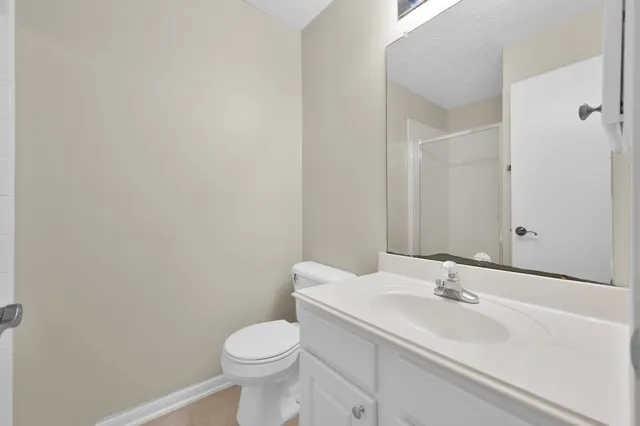 a front view of a house with a garage