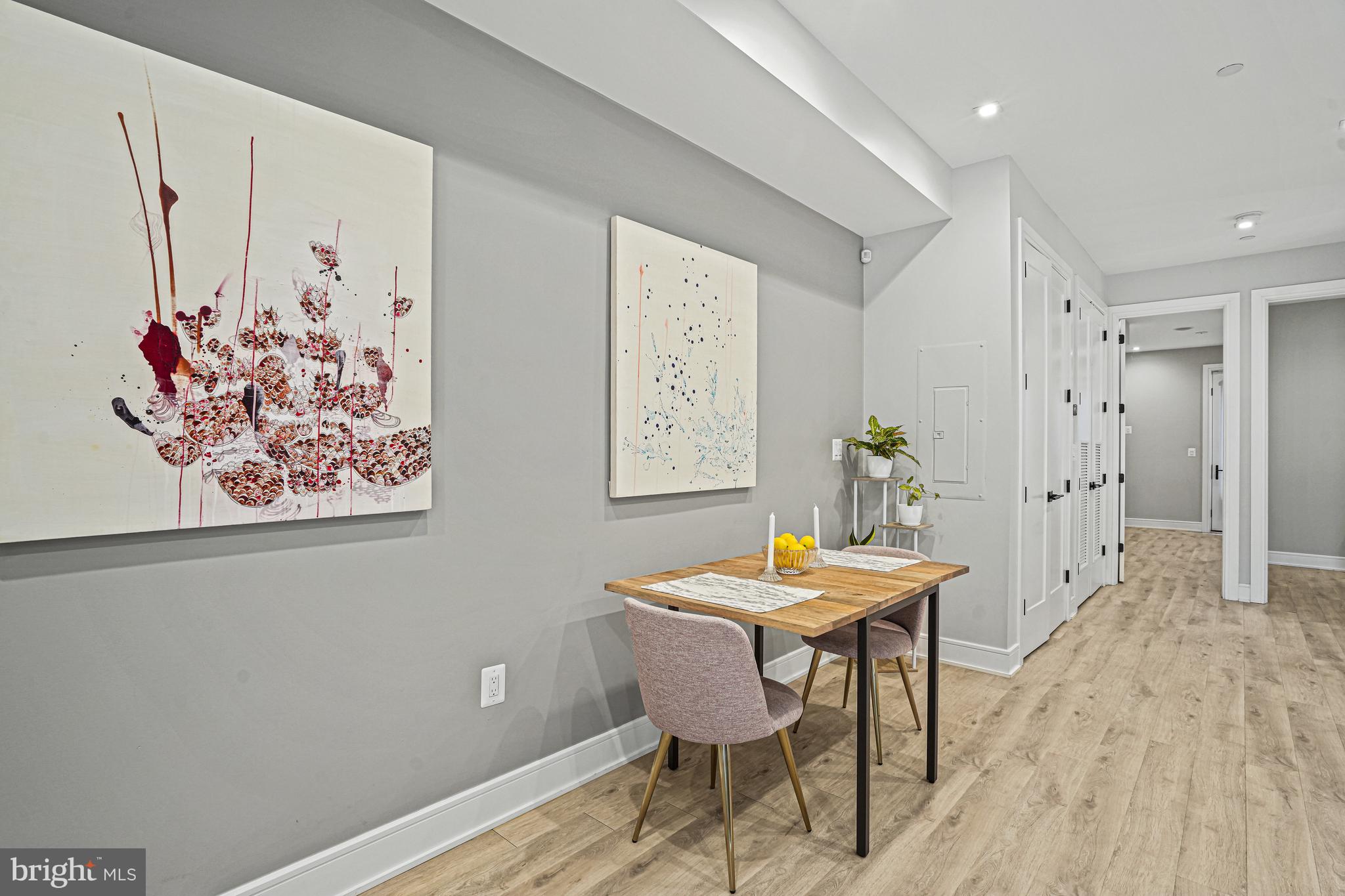 725 Euclid Street Northwest, Unit 1 Washington, DC 20001 - Photo 12 of 28 a view of a dining room with furniture window and wooden floor