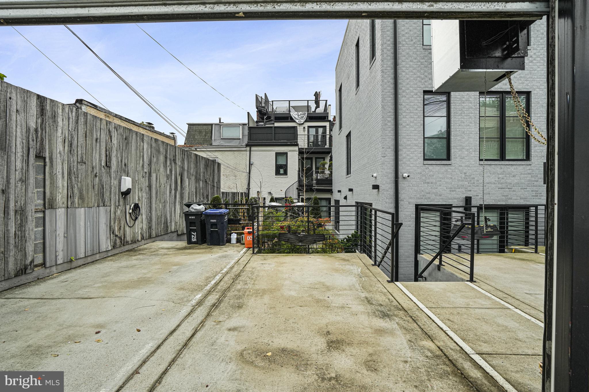 725 Euclid Street Northwest, Unit 1 Washington, DC 20001 - Photo 25 of 28 a view of a patio with table and chairs
