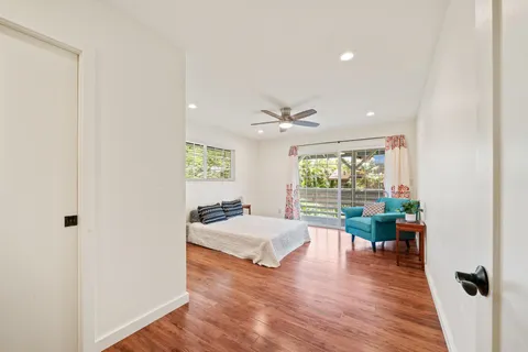 a view of bathroom with a sink mirror and shower
