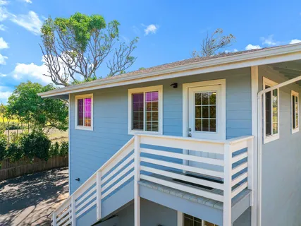 a view of a kitchen with a window