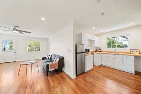 a view of livingroom with furniture and wooden floor