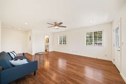 a bedroom with bed and window