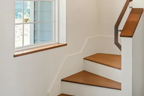 an entryway in a room with a window