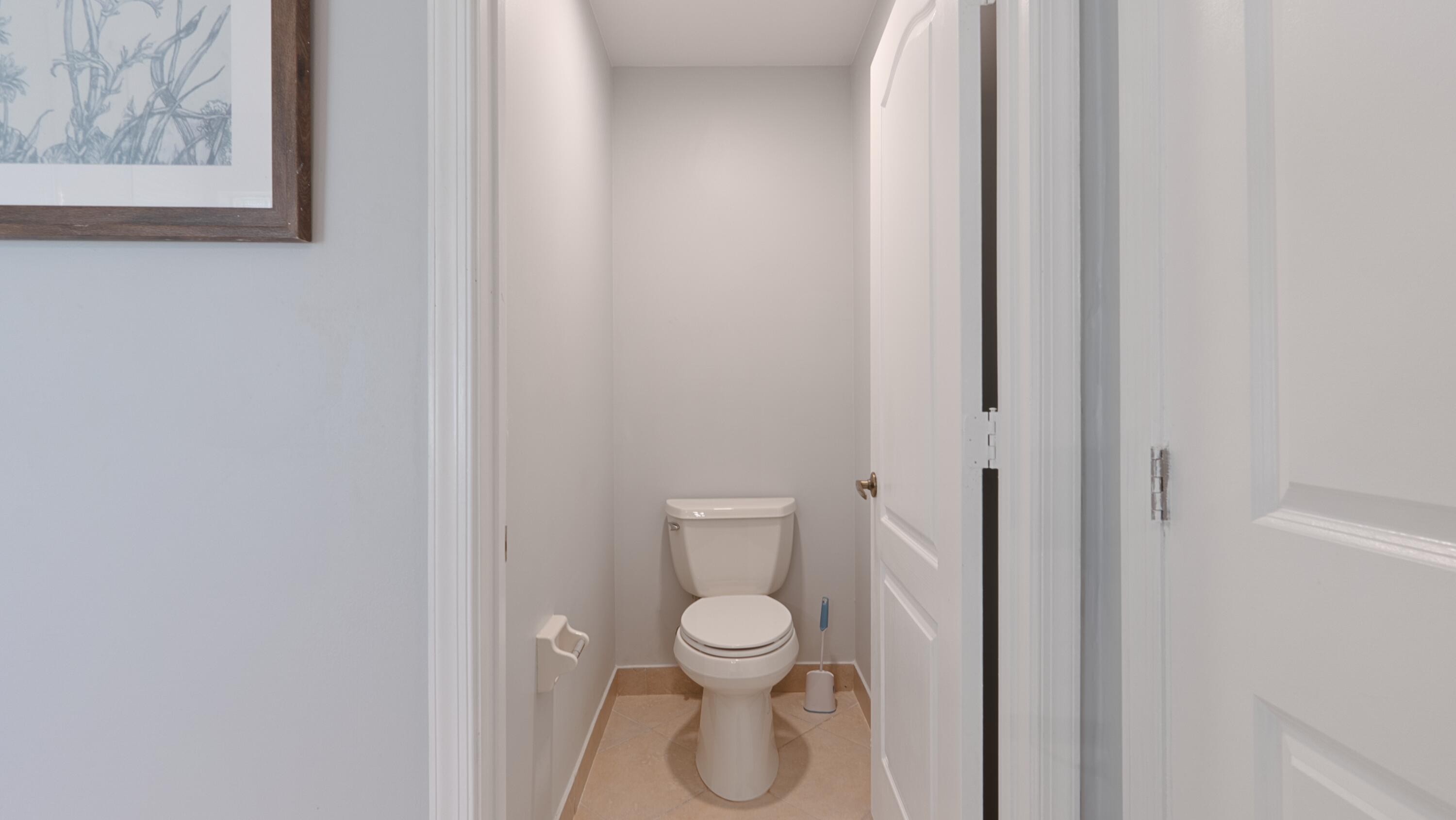 10789 Barque Court Boca Raton, FL 33498 - Photo 16 of 31 a bathroom with a toilet and a shower