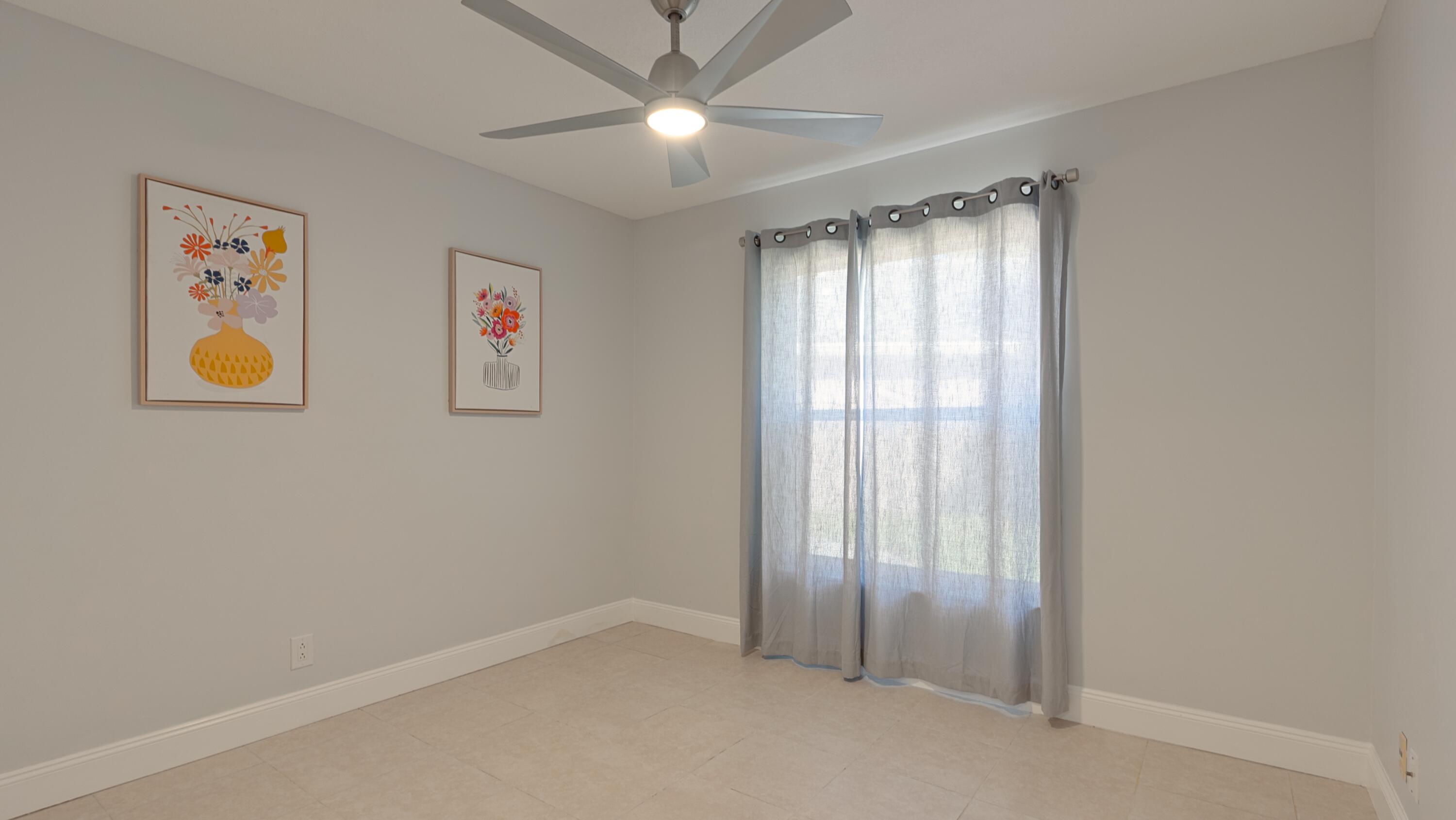 10789 Barque Court Boca Raton, FL 33498 - Photo 23 of 31 a view of an empty room with window and closet
