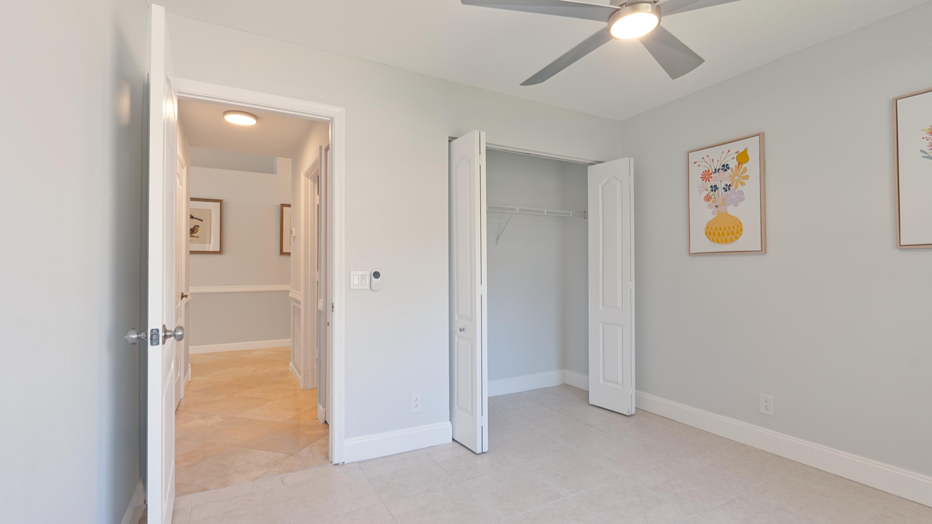 10789 Barque Court Boca Raton, FL 33498 - Photo 25 of 31 a view of a livingroom with a projector
