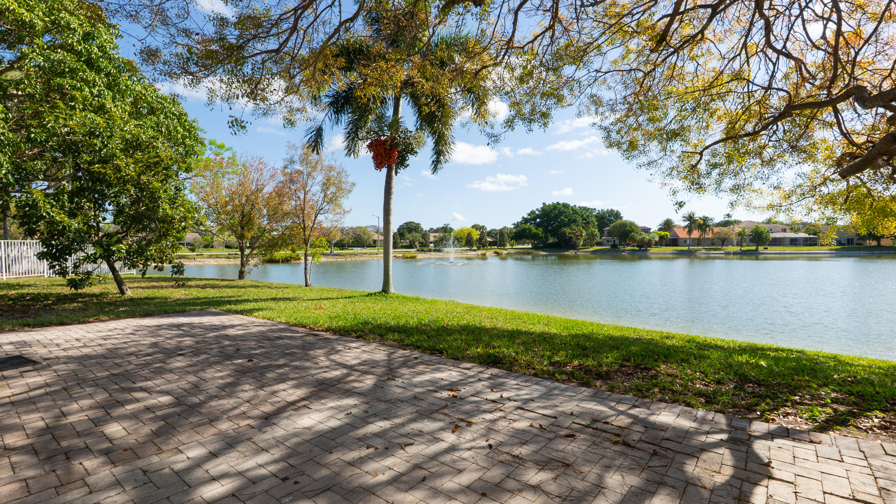 10789 Barque Court Boca Raton, FL 33498 - Photo 27 of 31 a view of a lake with houses