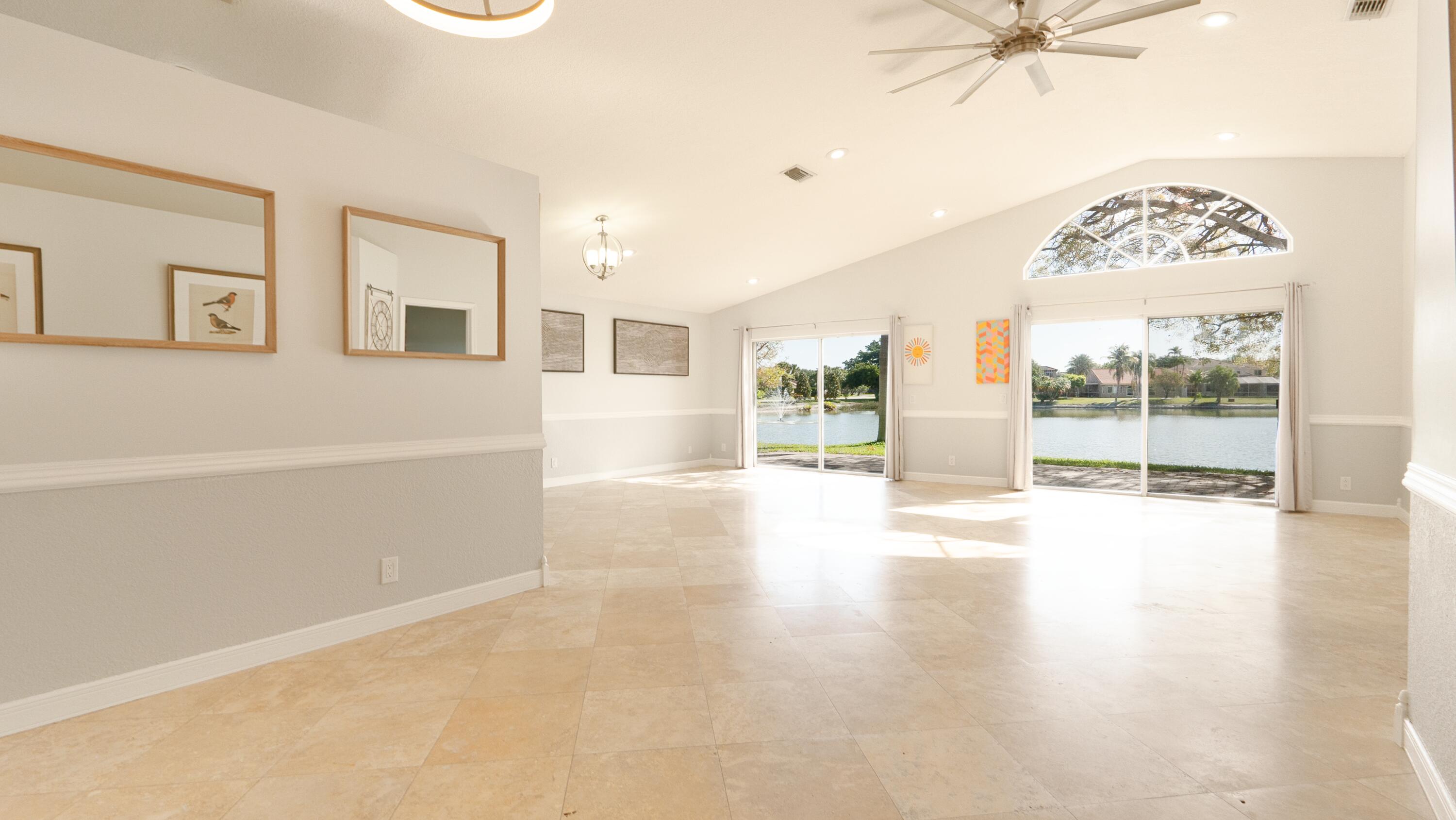 10789 Barque Court Boca Raton, FL 33498 - Photo 5 of 31 a view of an empty room with a window