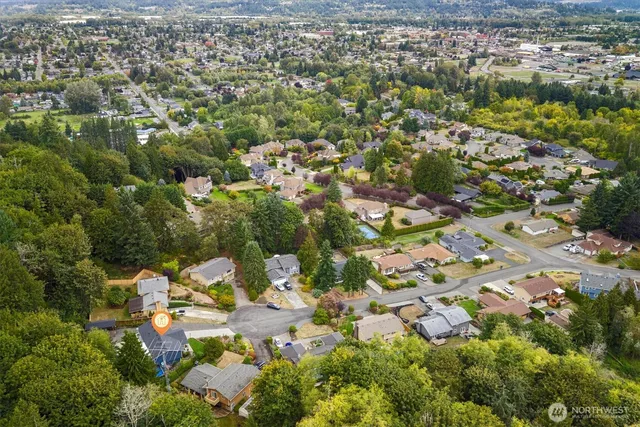 an aerial view of a city with lots of residential buildings