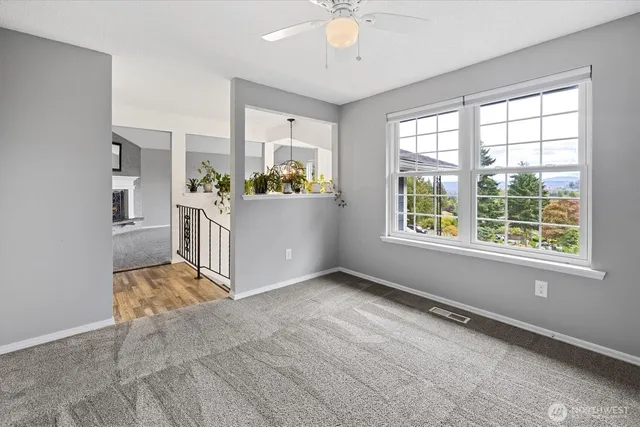 an empty room with windows