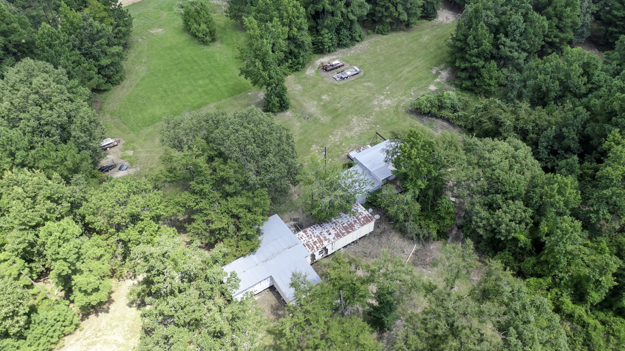 8374 Cattle Trail Road Midway, TX 75852 - Photo 6 of 16 an aerial view of a house with a yard