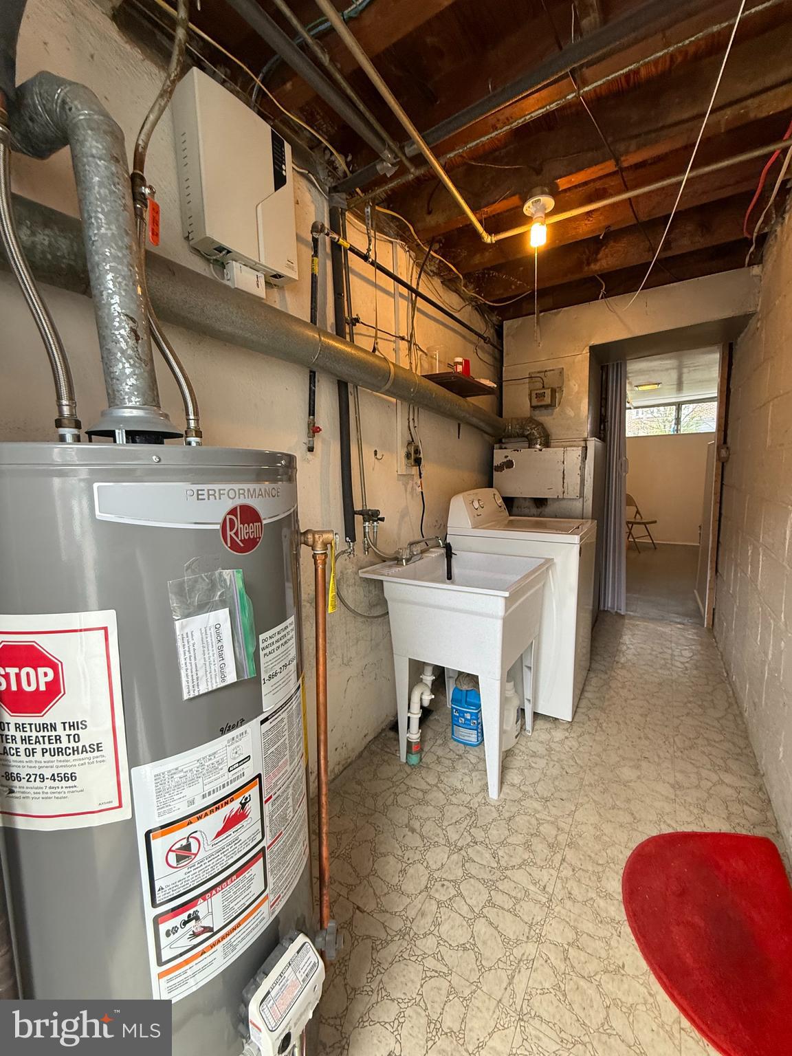 8031 Terry Street Philadelphia, PA 19136 - Photo 7 of 10 a utility room with dryer and washer