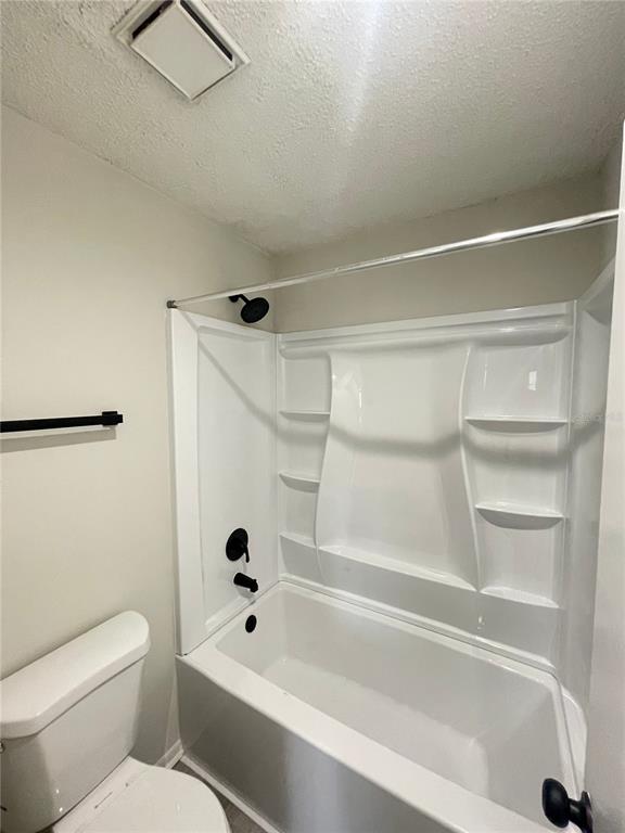 241 Afton Square, Unit 203 Altamonte Springs, FL 32714 - Photo 28 of 43 a bathroom with a toilet and a bathtub