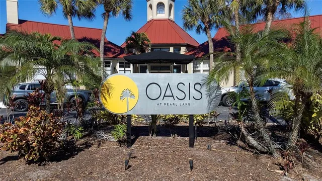 a view of outdoor space with signage and flags
