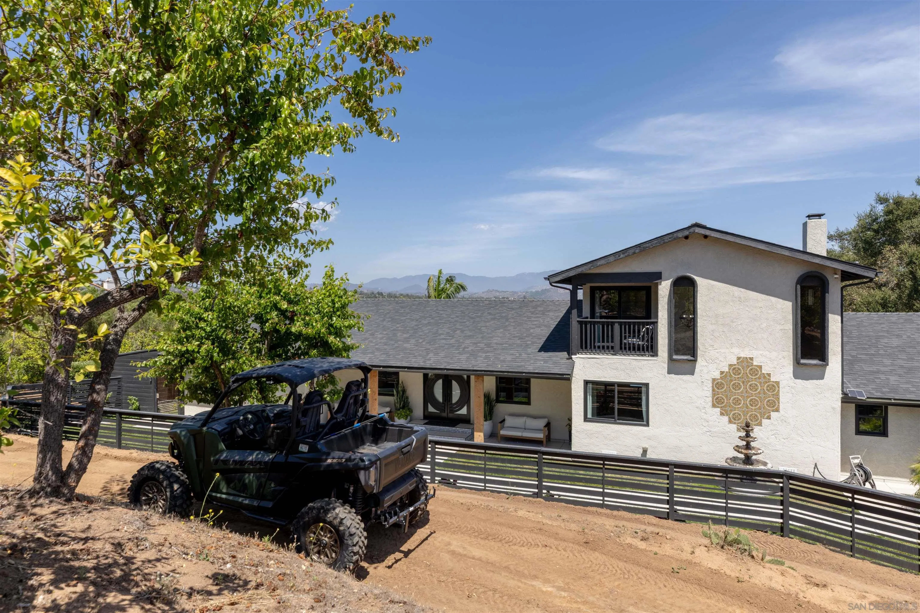 521 Rancho Camino Fallbrook, CA 92028 - Photo 7 of 72 a view of a house with a yard