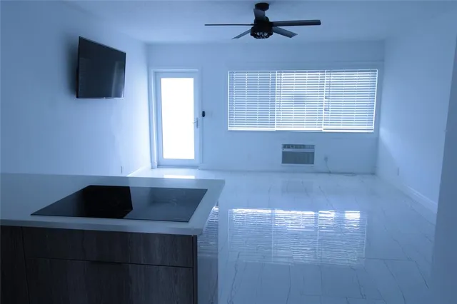 a kitchen with a sink and a window