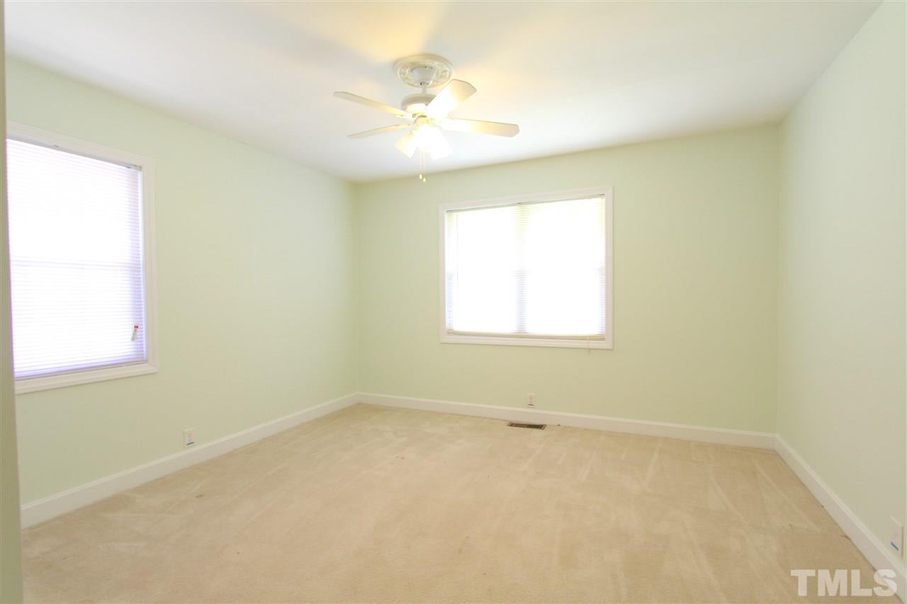 3910 Rock Quarry Road Raleigh, NC 27610 - Photo 14 of 23 an empty room with a window