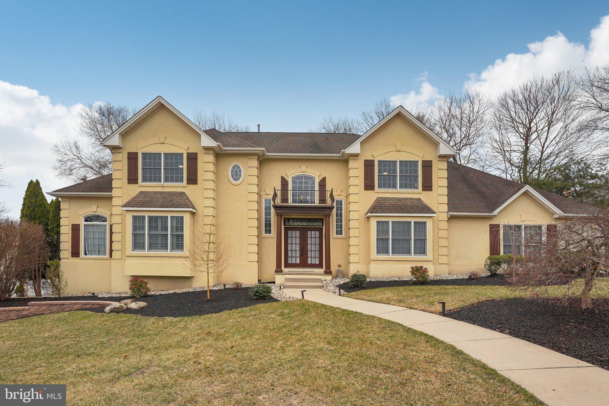 207 Summit Road Mount Laurel, NJ 08054 - Photo 2 of 57 a front view of a house with a yard