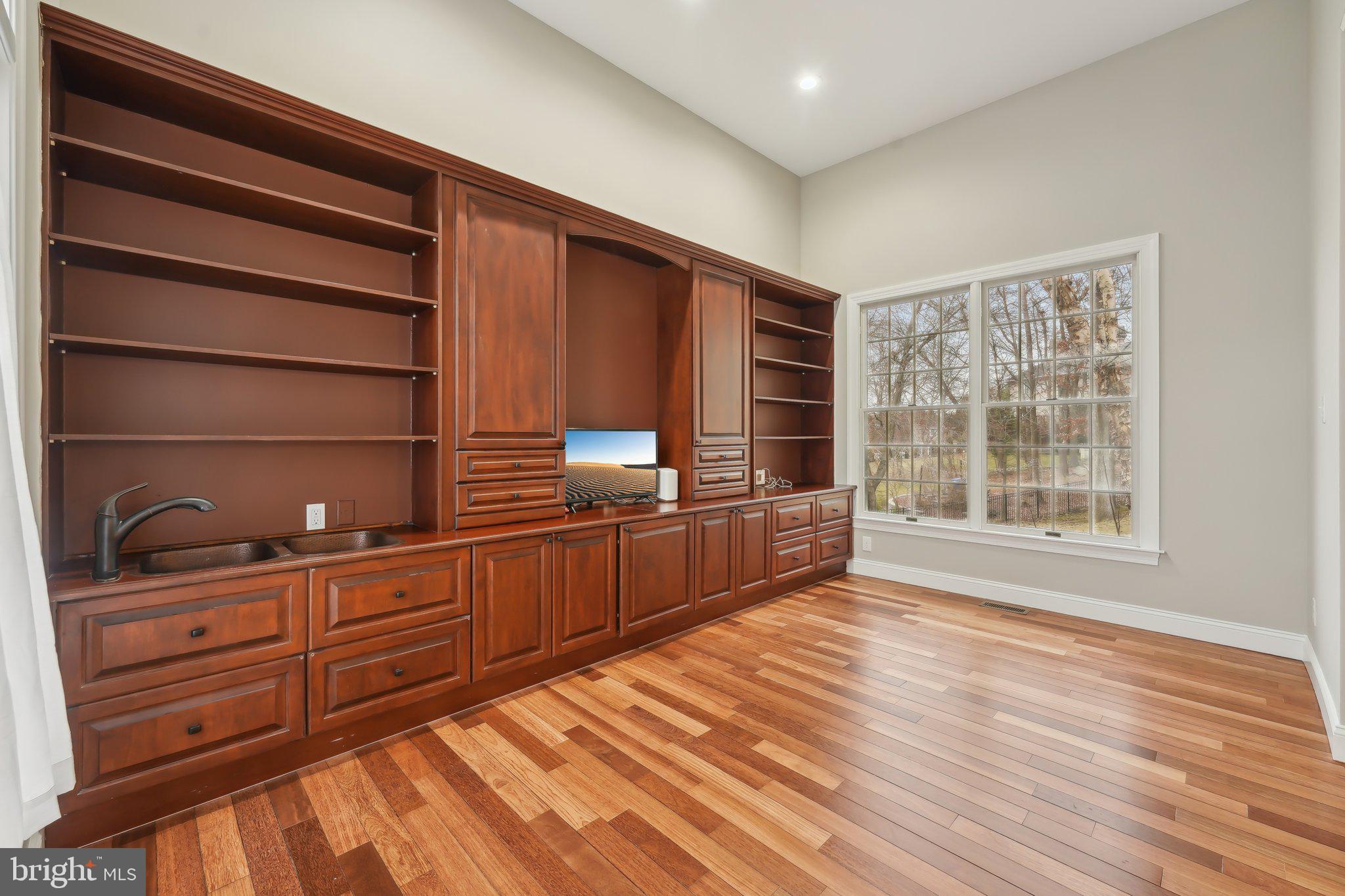 207 Summit Road Mount Laurel, NJ 08054 - Photo 22 of 57 a kitchen with stainless steel appliances wooden cabinets and a stove top oven