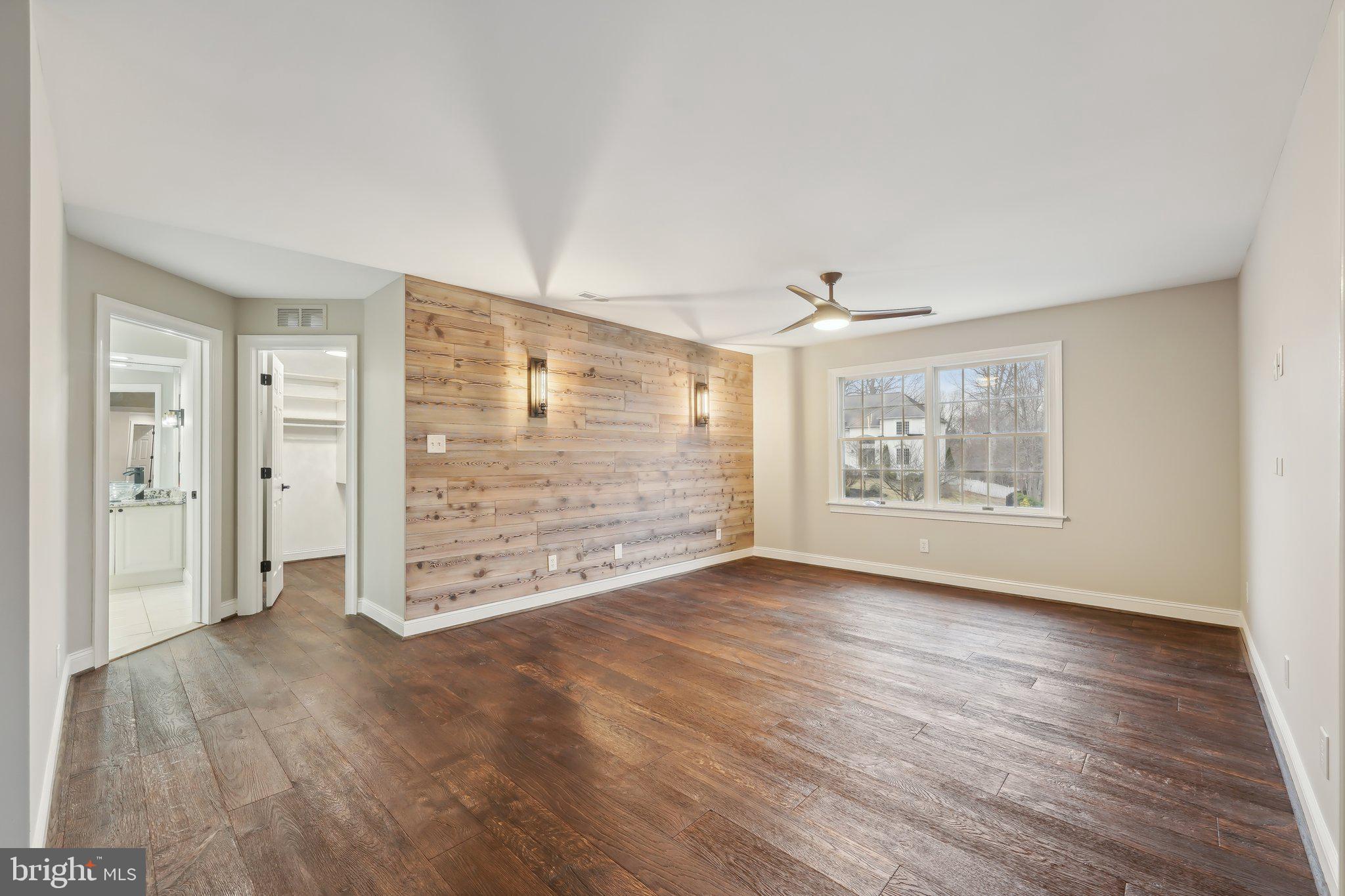 207 Summit Road Mount Laurel, NJ 08054 - Photo 26 of 57 an empty room with wooden floor closet and windows