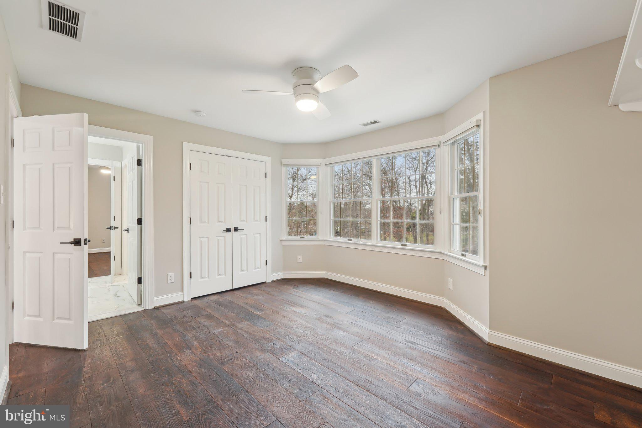 207 Summit Road Mount Laurel, NJ 08054 - Photo 33 of 57 a view of an empty room with wooden floor and a window